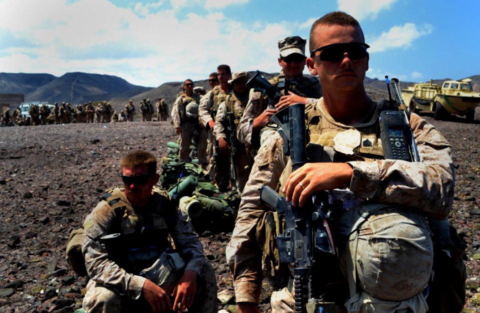 US Navy 111012-N-KA046-225 Marines assigned to the 22nd Marine Expeditionary Unit (22nd MEU) wait for a landing craft utility (LCU)