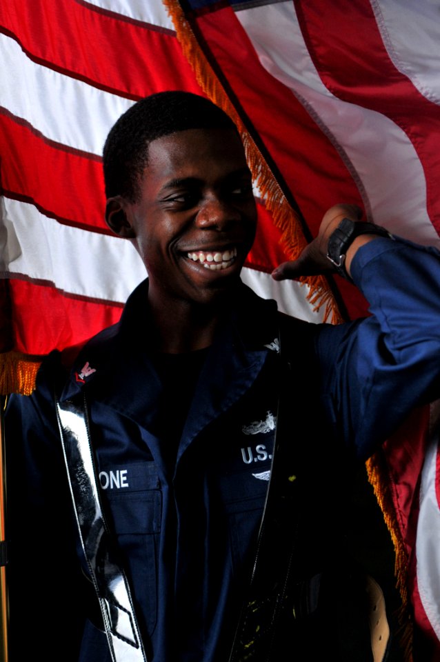 US Navy 111012-N-WW409-672 Ship's Serviceman 3rd Class Walter Malone, from Memphis, Tenn., trains with the color guard aboard the aircraft carrier