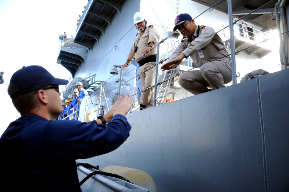 US Navy 111018-N-RP435-055 Lt. Cmdr. Wayne Liebold explains how Gladiator will break away from the Japan Maritime Self-Defense Force minesweeping s