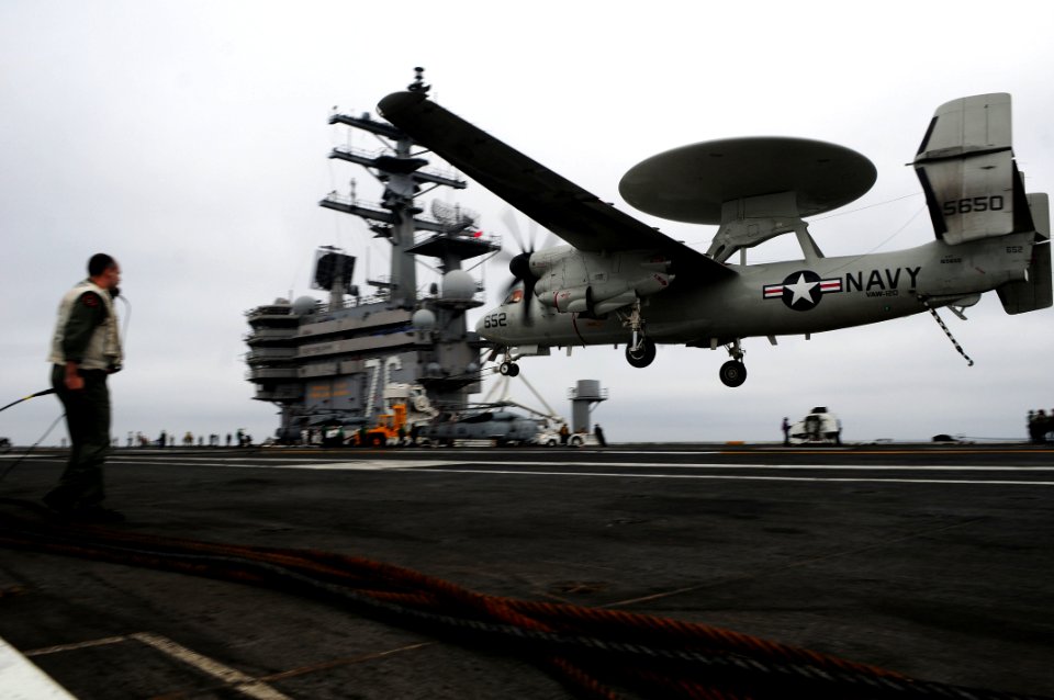US Navy 111014-N-UO379-076 An E-2C Hawkeye assigned to the Black Eagles of Airborne Early Warning Squadron (VAW) 113 prepares to land aboard the ai