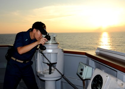 US Navy 111013-N-UE250-206 Ensign John Lee, assigned to the forward deployed Arleigh Burke-class guided-missile destroyer USS Fitzgerald (DDG 62),
