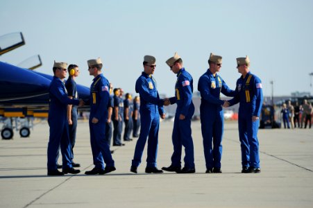 US Navy 111015-N-IR859-051 Pilots assigned to the U.S. Navy flight demonstration squadron, the Blue Angels, greet each other after the demonstratio