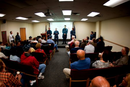 US Navy 111014-N-KK576-007 Sailors assigned to Naval Computer and Telecommunications Area Master Station Atlantic talk to veterans who served aboar