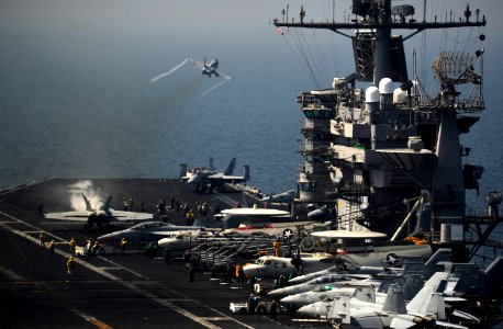 US Navy 111017-N-VN693-249 An F-A-18C Hornet assigned to the Golden Dragons of Strike Fighter Squadron (VFA) 192 launches from the aircraft carrier