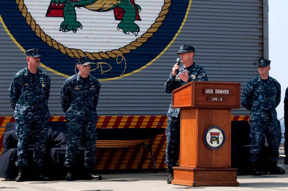 US Navy 111018-N-ZZ999-102 Capt. Michael Wettlaufer, commanding officer of the forward-deployed amphibious transport dock ship USS Denver (LPD 9) a
