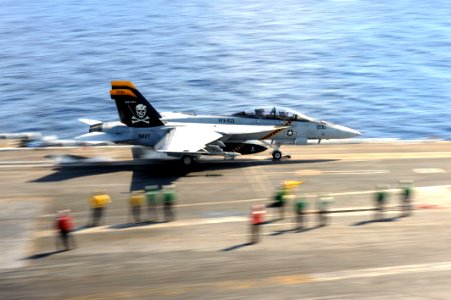 US Navy 111017-N-AU622-089 An F-A-18F Super Hornet assigned to the Jolly Rogers of Strike Fighter Squadron (VFA) 103 launches from the flight deck