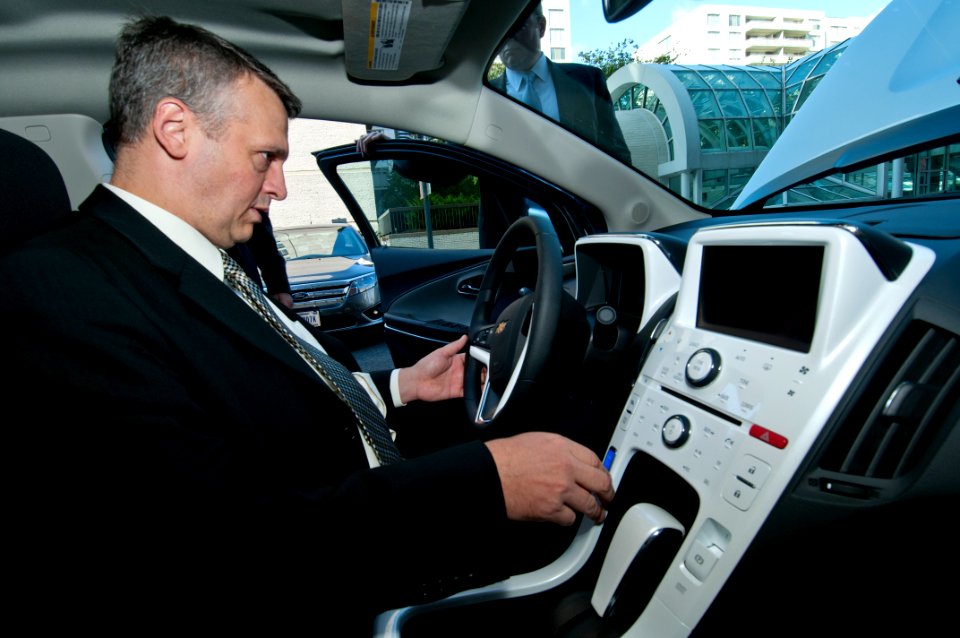 US Navy 111020-N-PM781-010 Tom Hicks, Deputy Assistant Secretary of the Navy for Energy, tests a Chevrolet Volt electric car after accepting the ve