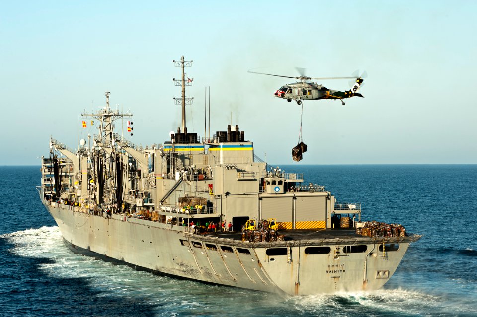 US Navy 111020-N-BT887-291 An MH-60S Sea Hawk helicopter assigned to the Eightballers of Helicopter Sea Combat Squadron (HSC) 8, lifts cargo