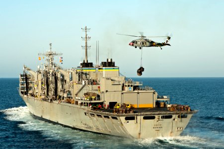 US Navy 111020-N-BT887-291 An MH-60S Sea Hawk helicopter assigned to the Eightballers of Helicopter Sea Combat Squadron (HSC) 8, lifts cargo