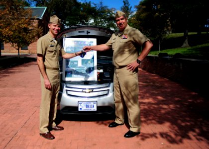 US Navy 111021-N-KV696-348 Cmdr. David Varner, commanding officer of Naval Support Activity Washington, receives the keys to a Chevrolet Volt elect