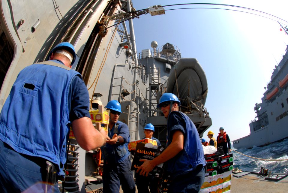 US Navy 111018-N-DU438-374 Sailors transfer stores aboard the guided-missile cruiser USS Gettysburg (CG 64) during a connected replenishment with t