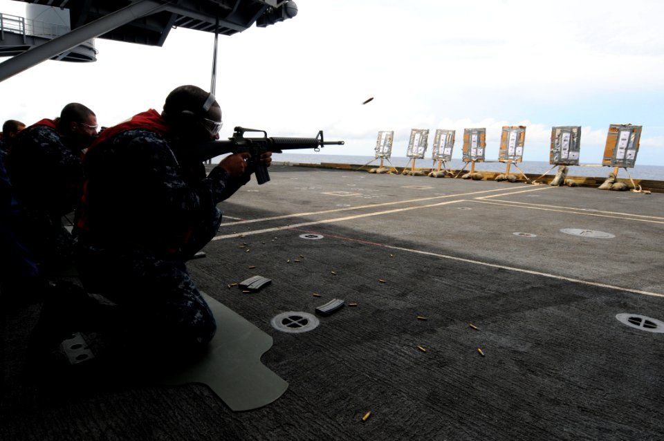 US Navy 111019-N-JO245-044 Sailors fire M16 rifles during a live-fire exercise aboard the aircraft carrier USS George Washington (CVN 73)