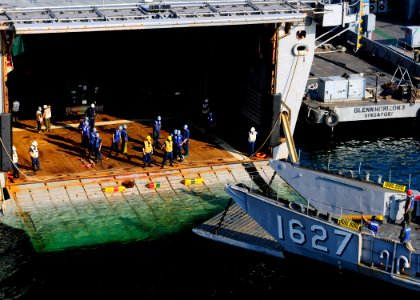 US Navy 111022-N-WJ771-062 A landing craft utility approaches the well deck of the amphibious transport dock ship USS Denver (LPD 9) in preparation