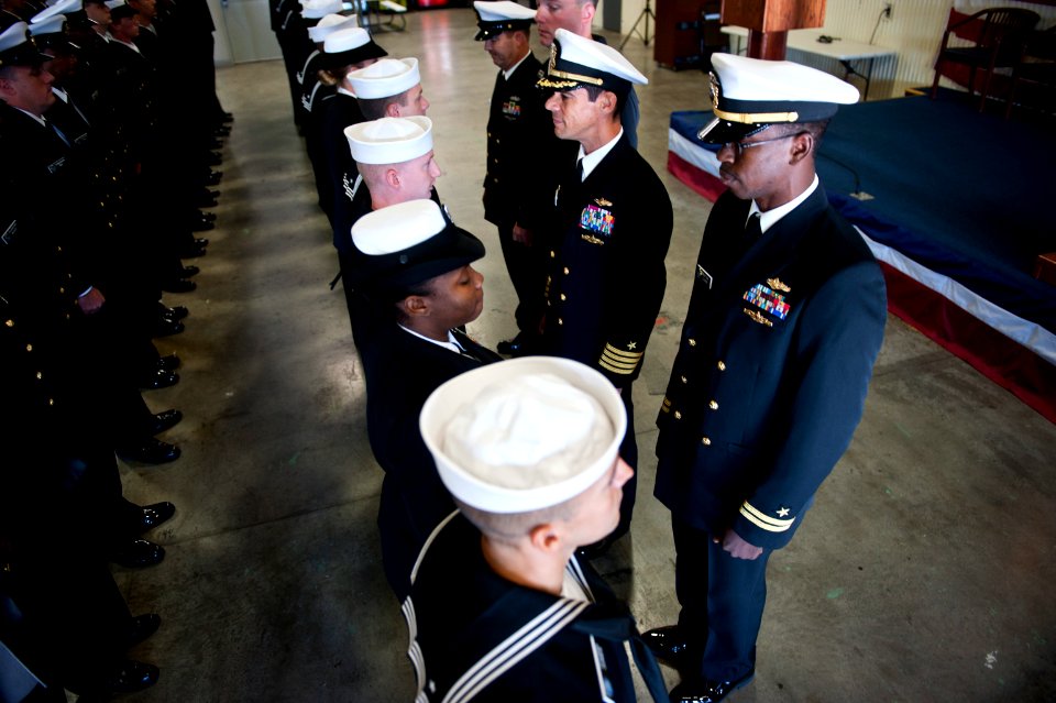 US Navy 111020-N-KK576-015 Capt. John W. Chandler, commanding officer, Naval Network Warfare Command, conducts a dress blue inspection