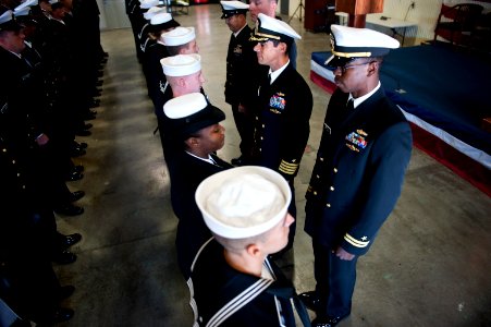 US Navy 111020-N-KK576-015 Capt. John W. Chandler, commanding officer, Naval Network Warfare Command, conducts a dress blue inspection