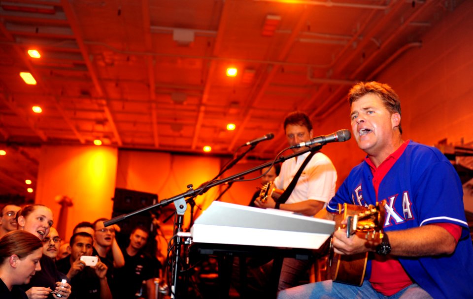 US Navy 111019-N-QL471-785 The country music band The Frontmen perform in the hangar bay aboard the aircraft carrier USS George H.W. Bush (CVN 77)