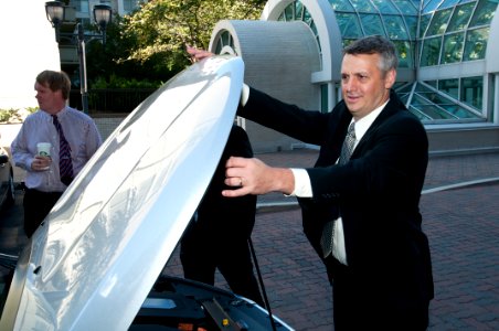 US Navy 111020-N-PM781-011 Tom Hicks, Deputy Assistant Secretary of the Navy for Energy, gets ready to test a Chevrolet Volt electric car