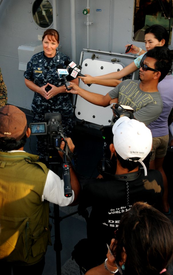 US Navy 111022-N-MW330-029 mdr. Carol McKenzie, commanding officer of the amphibious dock landing ship USS Germantown (LSD 42), answers questions f