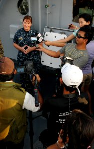 US Navy 111022-N-MW330-029 mdr. Carol McKenzie, commanding officer of the amphibious dock landing ship USS Germantown (LSD 42), answers questions f