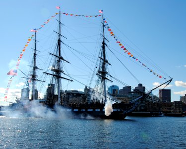US Navy 111021-N-SH953-421 USS Constitution fires a 17-gun salute toward the United States Coast Guard Station Sector Boston to celebrate its 214th