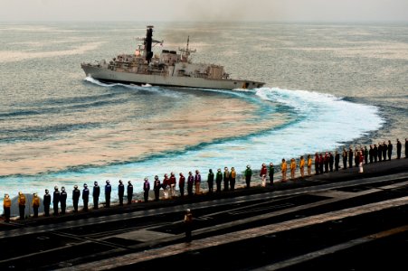 US Navy 111024-N-BT887-954 The Royal Navy Duke-class frigate HMS St. Albans (F 83) breaks away from the Nimitz-class aircraft carrier USS John C. S