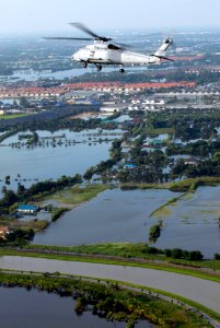 US Navy 111022-N-WW409-275 An SH-60F Sea Hawk helicopter assigned to Helicopter Anti-Submarine Squadron (HS) 14, flies around the Bangkok area