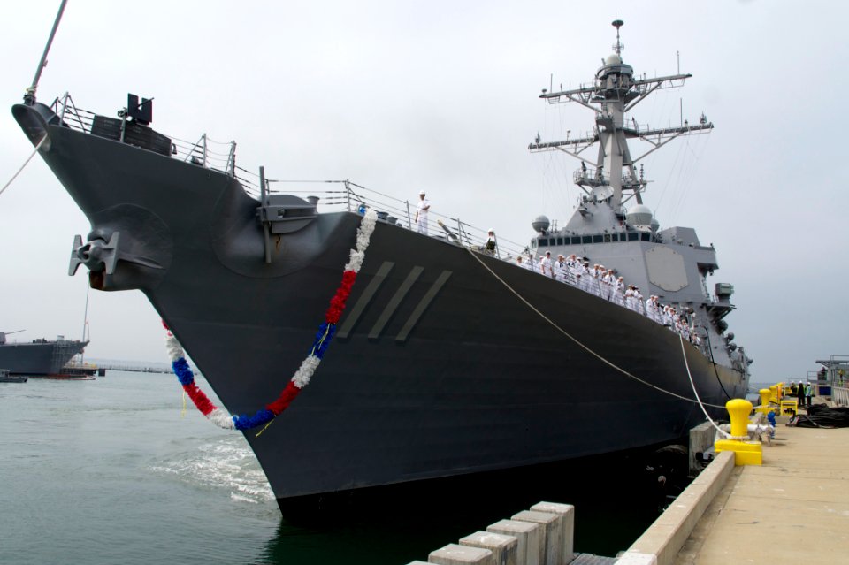 US Navy 111024-N-ZC343-667 Family and friends greet Sailors aboard the guided-missile destroyer USS Spruance (DDG 111) as the ship arrives at its n