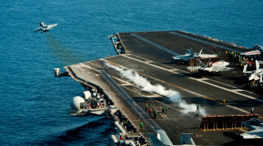 US Navy 111024-N-BT887-526 An F-A-18C Hornet assigned to the Golden Dragons of Strike Fighter Squadron (VFA) 192 launches from the Nimitz-class air
