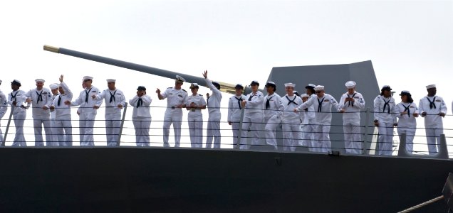 US Navy 111024-N-ZC343-674 Sailors aboard the guided-missile destroyer USS Spruance (DDG 111) are greeted by family and friends at Naval Base San D