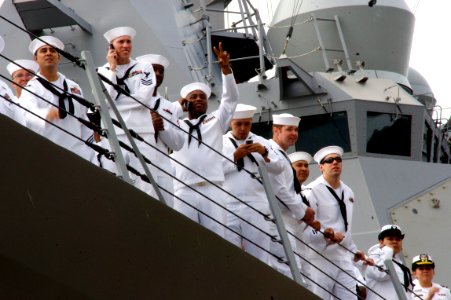 US Navy 111024-N-ZC343-663 Sailors aboard the guided-missile destroyer USS Spruance (DDG 111) are greeted by family and friends at Naval Base San D
