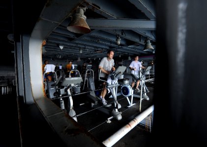 US Navy 111023-N-OY799-190 Sailors work out on the starboard boat davit sponson aboard the Nimitz-class aircraft carrier USS John C. Stennis (CVN 7