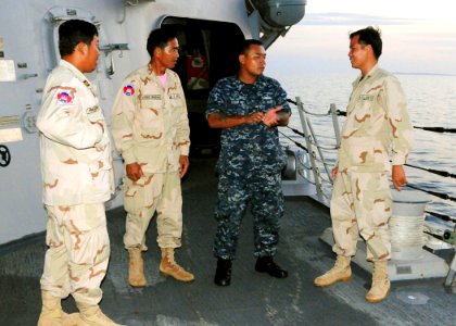 US Navy 111025-N-NJ145-002 Boatswain's Mate 2nd Class Suorth Suom, a Cambodian-American Sailor assigned to the guided-missile destroyer USS Kidd (D