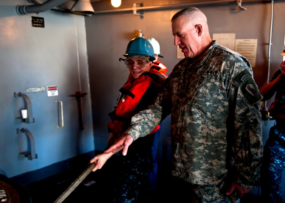 US Navy 111027-N-BT887-189 Command Sgt. Maj. Frank A. Grippe, the senior enlisted leader at U.S. Central Command, observes a replenishment at sea a
