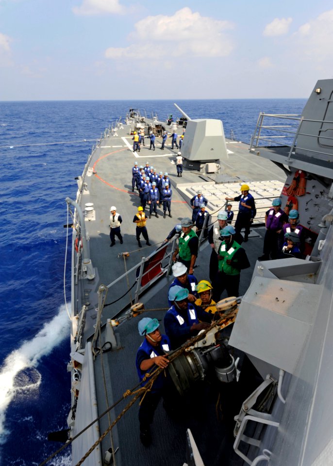 US Navy 111025-N-VH839-012 Sailors assigned to the guided-missile destroyer USS Wayne E. Meyer (DDG 108) man replenishment stations during a replen