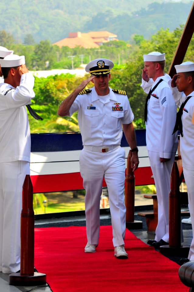 US Navy 111028-N-JH293-028 Capt. Thomas P. Stanley, commanding officer of the submarine tender USS Emory S. Land (AS 39), is rendered honors as he