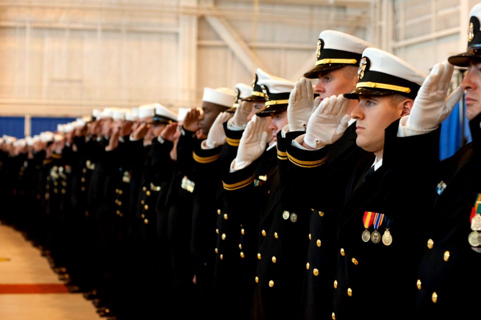 US Navy 111029-N-NY820-188 Sailors assigned to the Virginia-class attack submarine USS California (SSN 781) salute during the commissioning ceremo