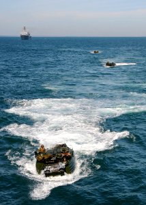 US Navy 111026-N-VE788-021 Amphibious assault vehicles from Marine Battalion Landing Team 12 (BLT 12) transit to the multi-purpose amphibious assau