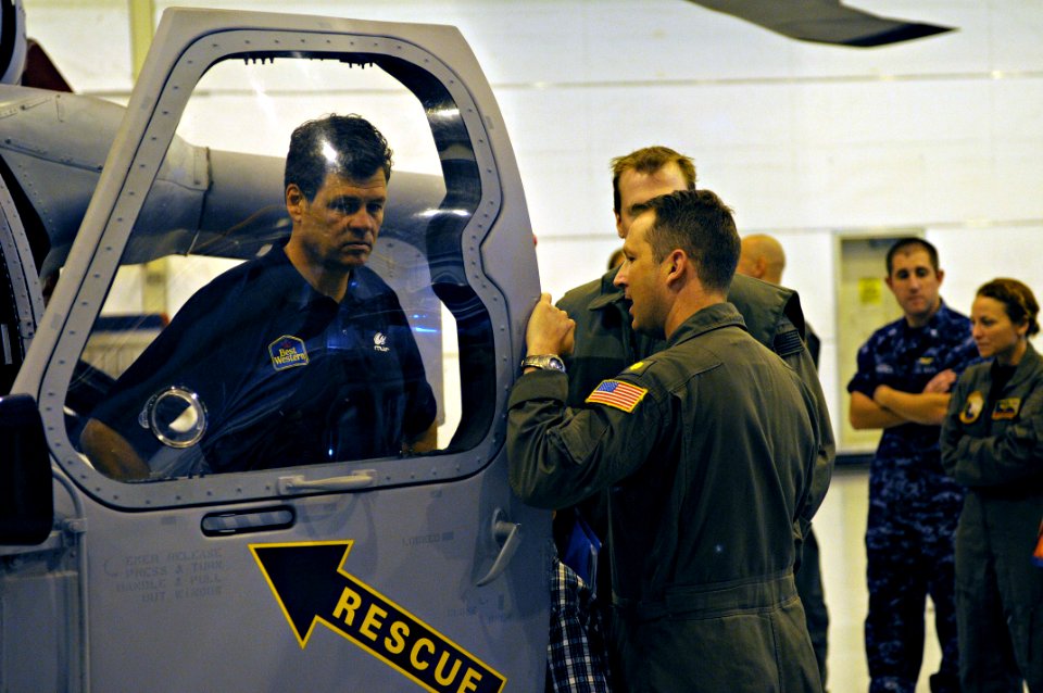 US Navy 111026-N-XO436-081 NASCAR driver Michael Waltrip, left, visits the Fleet Angels of Helicotper Sea Combat Support Squadron (HSC) 2