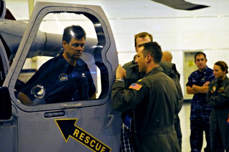 US Navy 111026-N-XO436-081 NASCAR driver Michael Waltrip, left, visits the Fleet Angels of Helicotper Sea Combat Support Squadron (HSC) 2