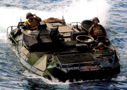 US Navy 111101-N-WJ771-131 An amphibious assault vehicle assigned to the 31st Marine Expeditionary Unit (31st MEU) enters the well deck of the forw