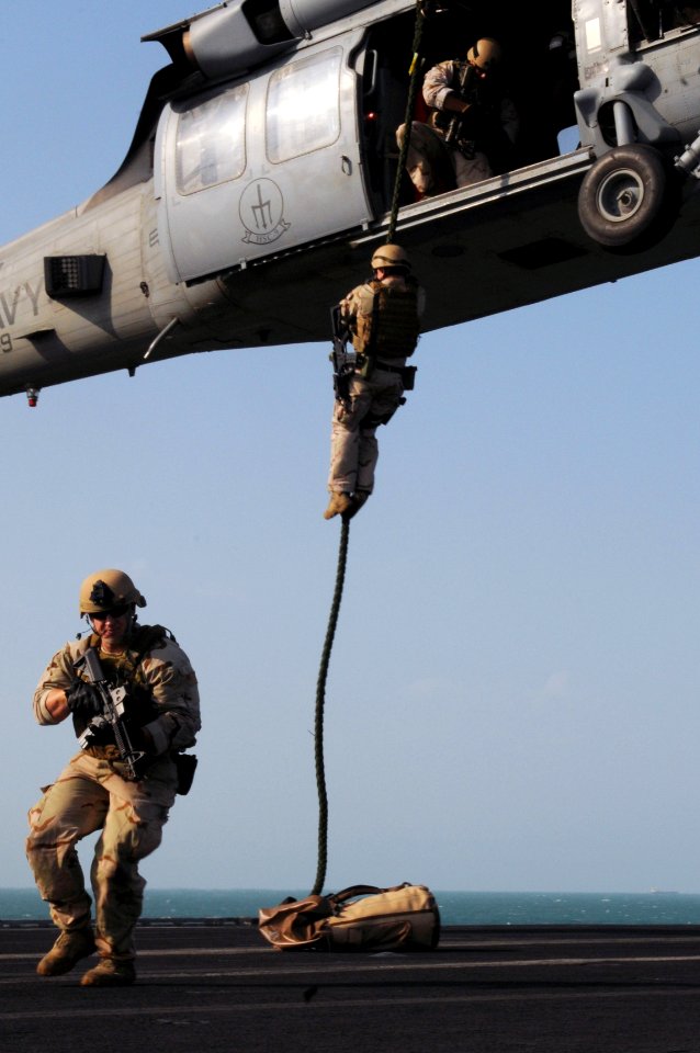 US Navy 111101-N-JD217-280 Explosive Ordnance Disposal 2nd Class Bradley Kelly, assigned to Explosive Ordnance Disposal Mobile Unit (EODMU) 2, take