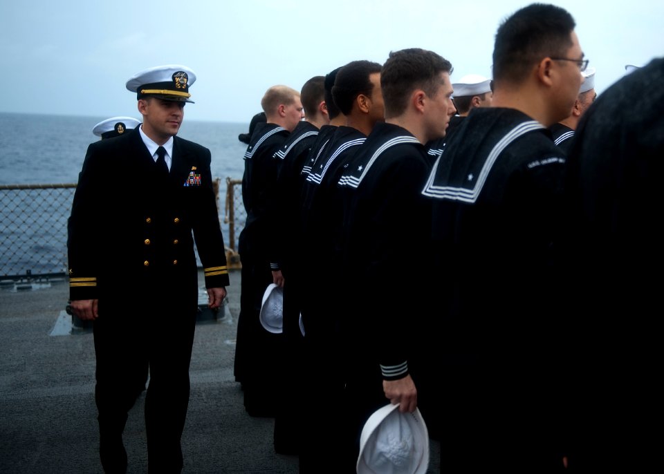 US Navy 111029-N-FI736-028 Lt. Joshua Welle, chief engineer for the guided-missile destroyer USS Arleigh Burke (DDG 51), inspects engineering depar