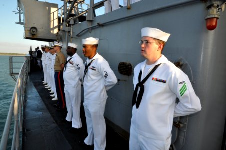 US Navy 111101-N-YX169-085 Sailors and Marines aboard the amphibious transport dock ship USS Ponce (LPD 15) man the rails as the ship enters Port C