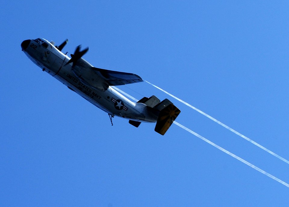 US Navy 111029-N-DS193-011 A C-2A Greyhound from the Providers of Fleet Logistics Support Squadron (VRC) 30, Detachment 5, flies over of the aircra