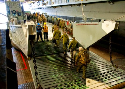 US Navy 111031-N-NR955-090 Marines board a landing craft utility from Assault Craft Unit (ACU) 2