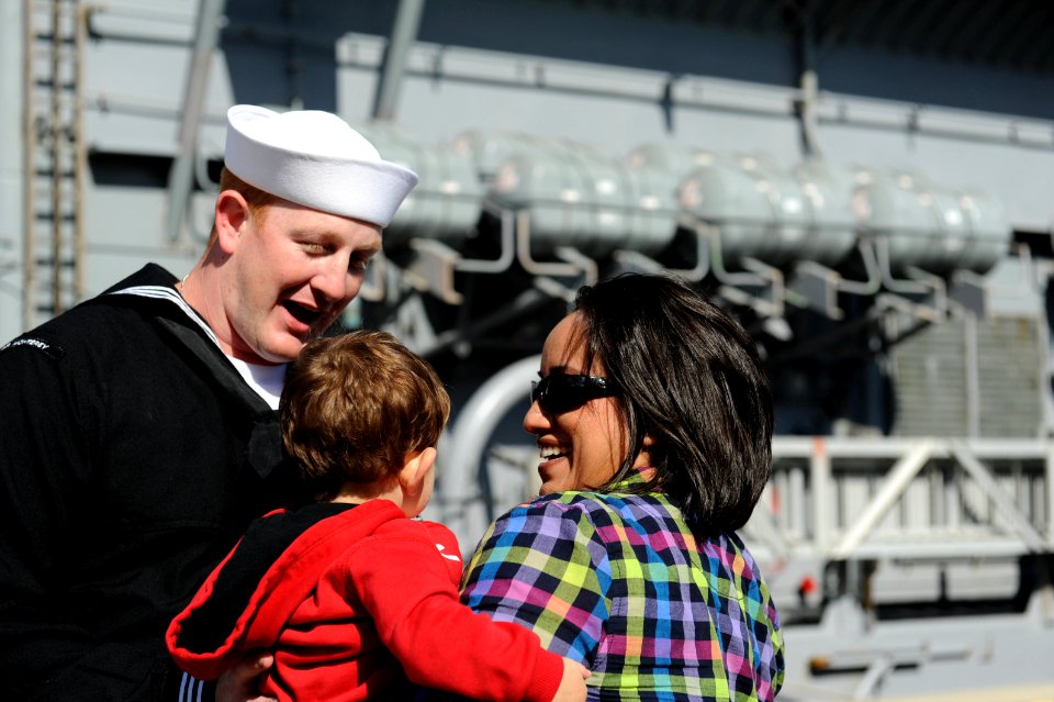 US Navy 111101-N-XR557-179 A Sailor assigned to the guided-missile cruiser USS Monterey (CG 61) greets his family upon returning from an eight-mont