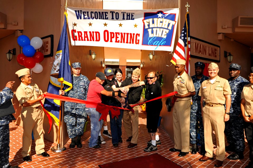 US Navy 111101-N-YR391-052 Celebrity chefs help cut the ribbon during the grand opening of the remodeled base galley