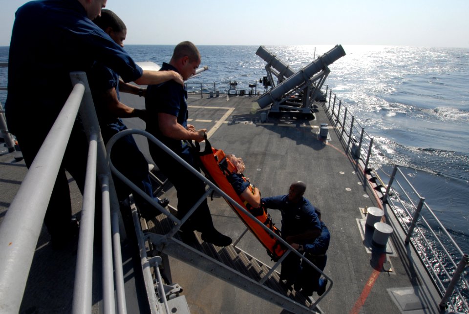US Navy 111102-N-DU438-257 Sailors transport a simulated wounded Sailor on a stretcher during a medical training drill aboard the guided-missile cr