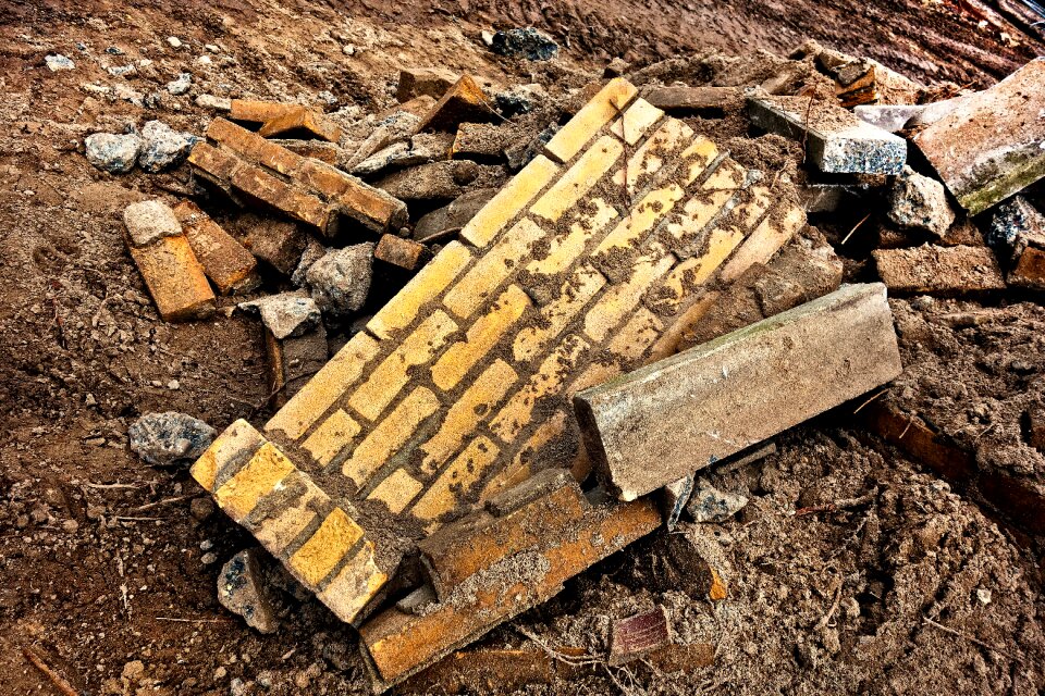 Broken wall rubble demolished