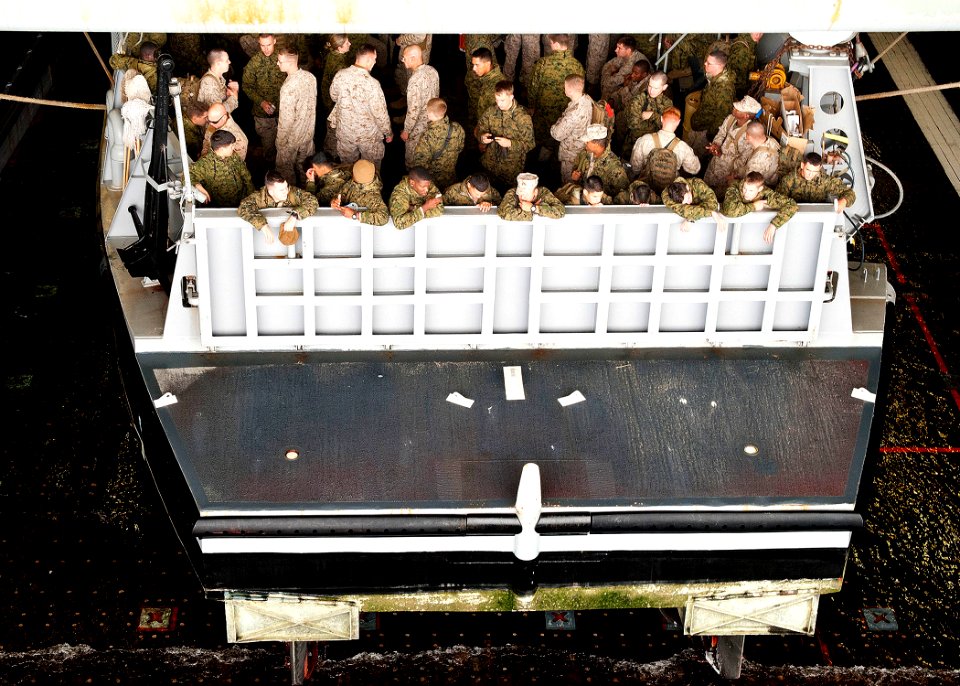 US Navy 111031-N-NR955-062 Marines wait to debark a landing craft utility from Assault Craft Unit